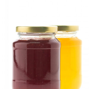 A glass honey jar