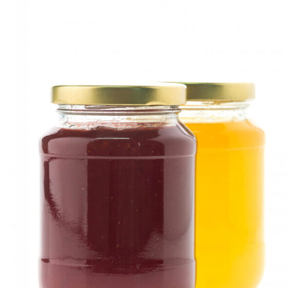 A glass honey jar